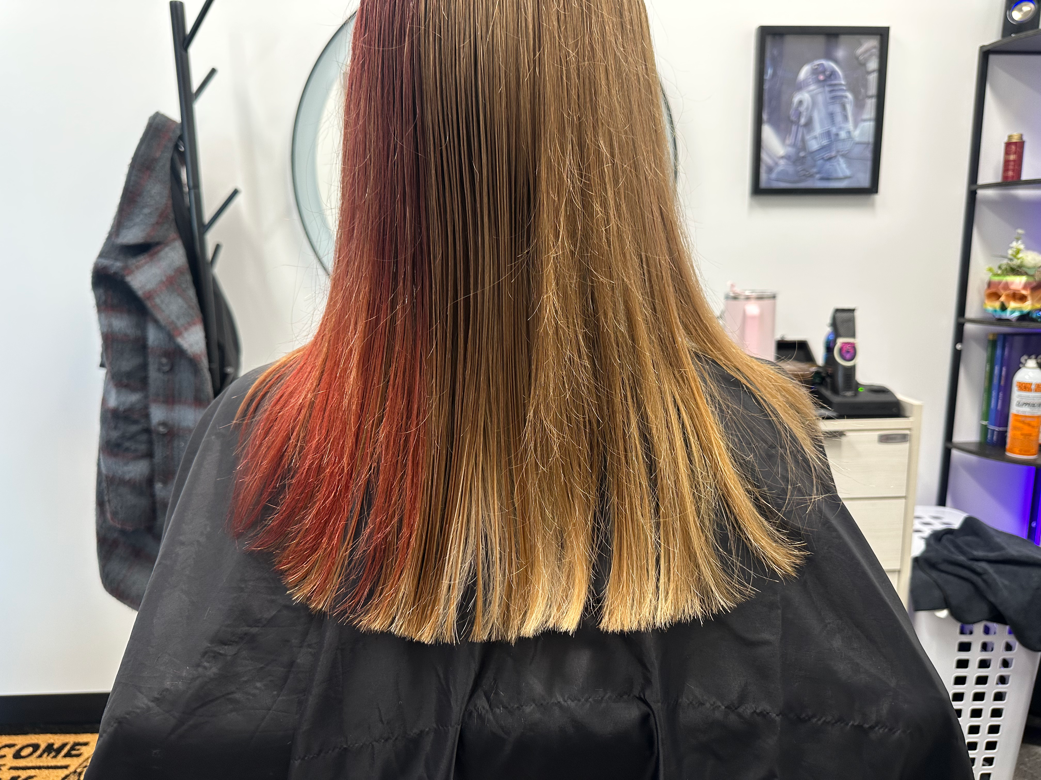 Stylish haircut with iridescent color highlights