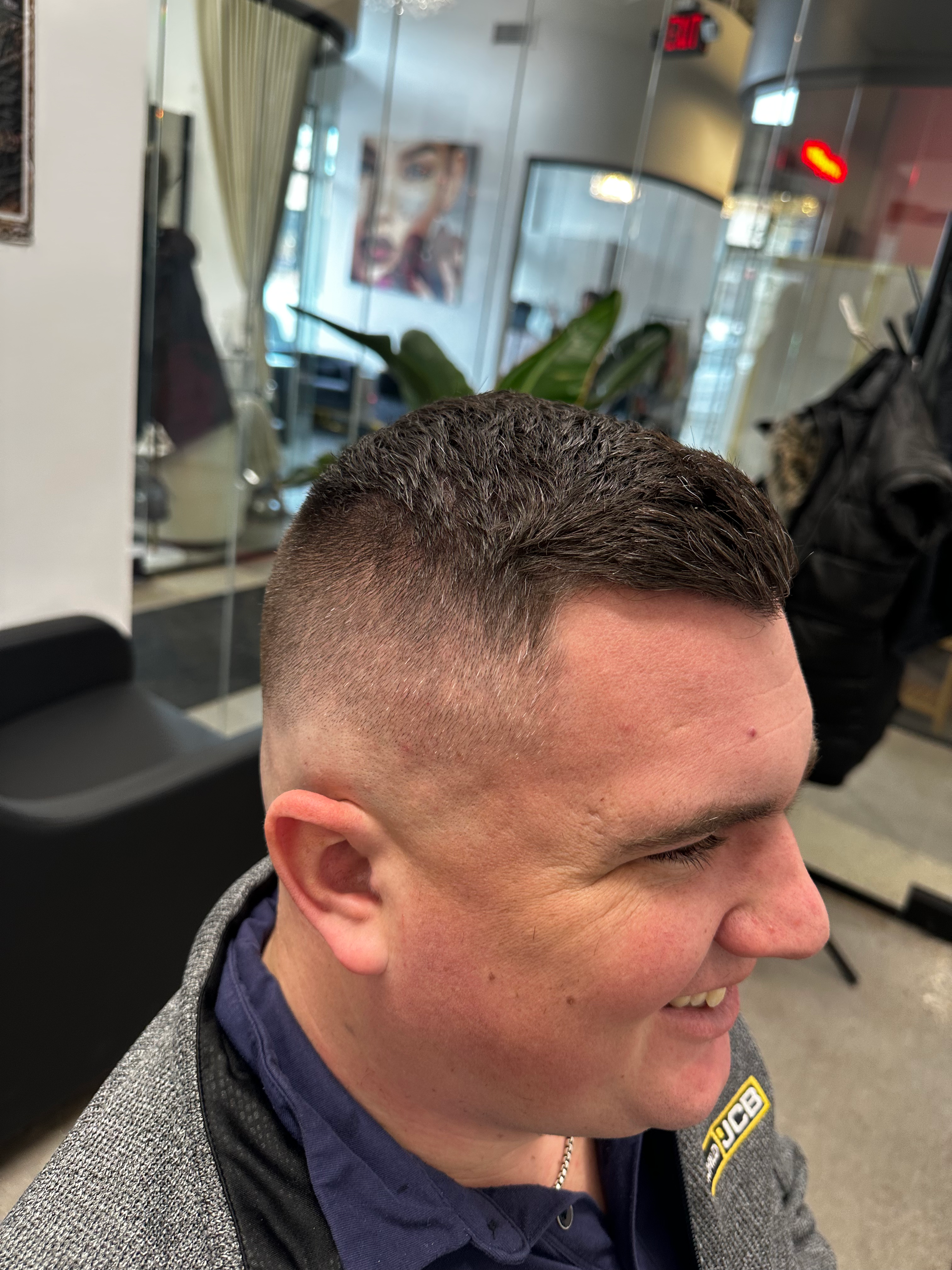 Modern fade haircut with salt-and-pepper hair
